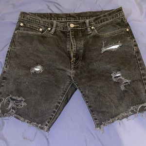 Black distressed Levi Jean shorts